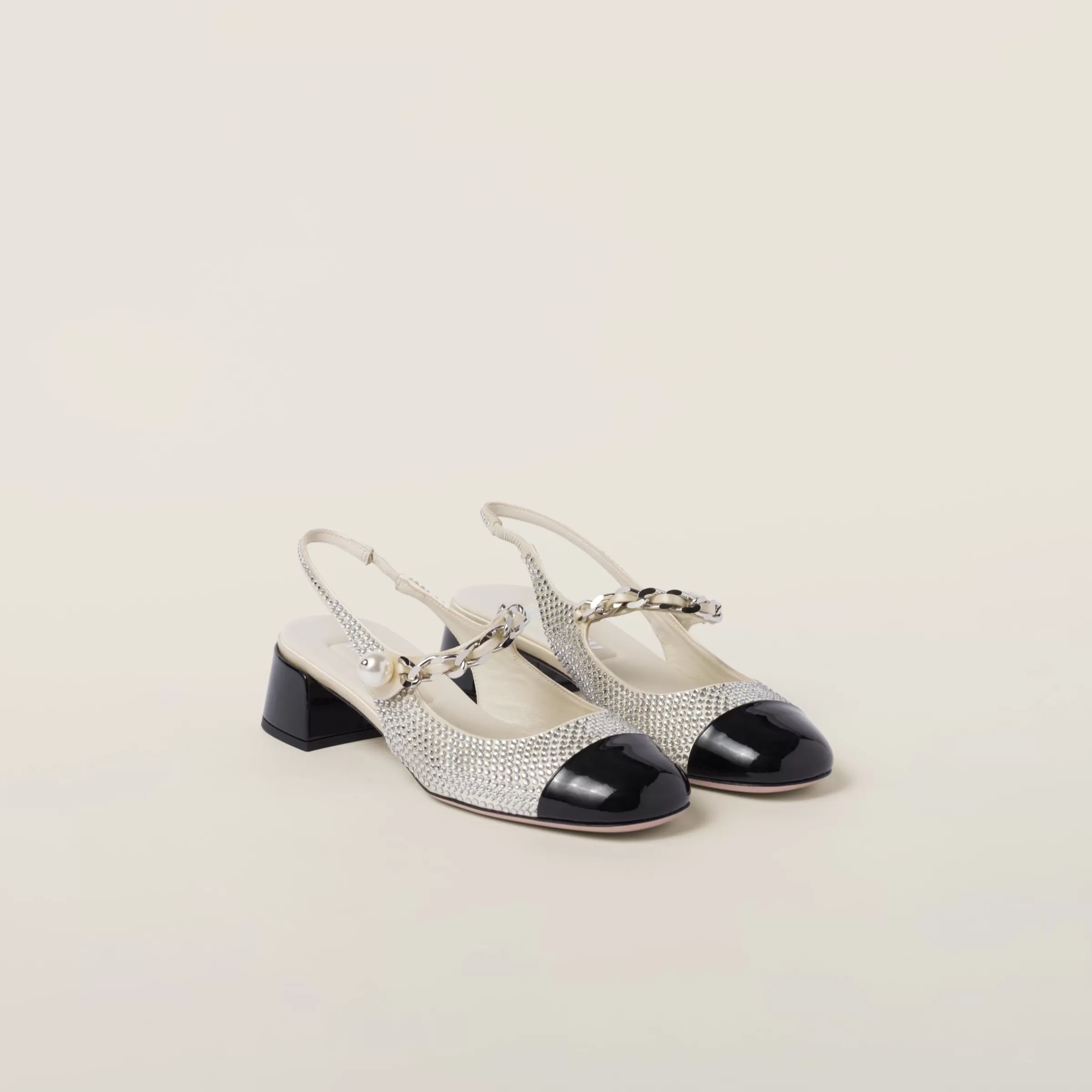 Miu Miu Décolleté slingback in raso e cristalli Avorio/Nero Store