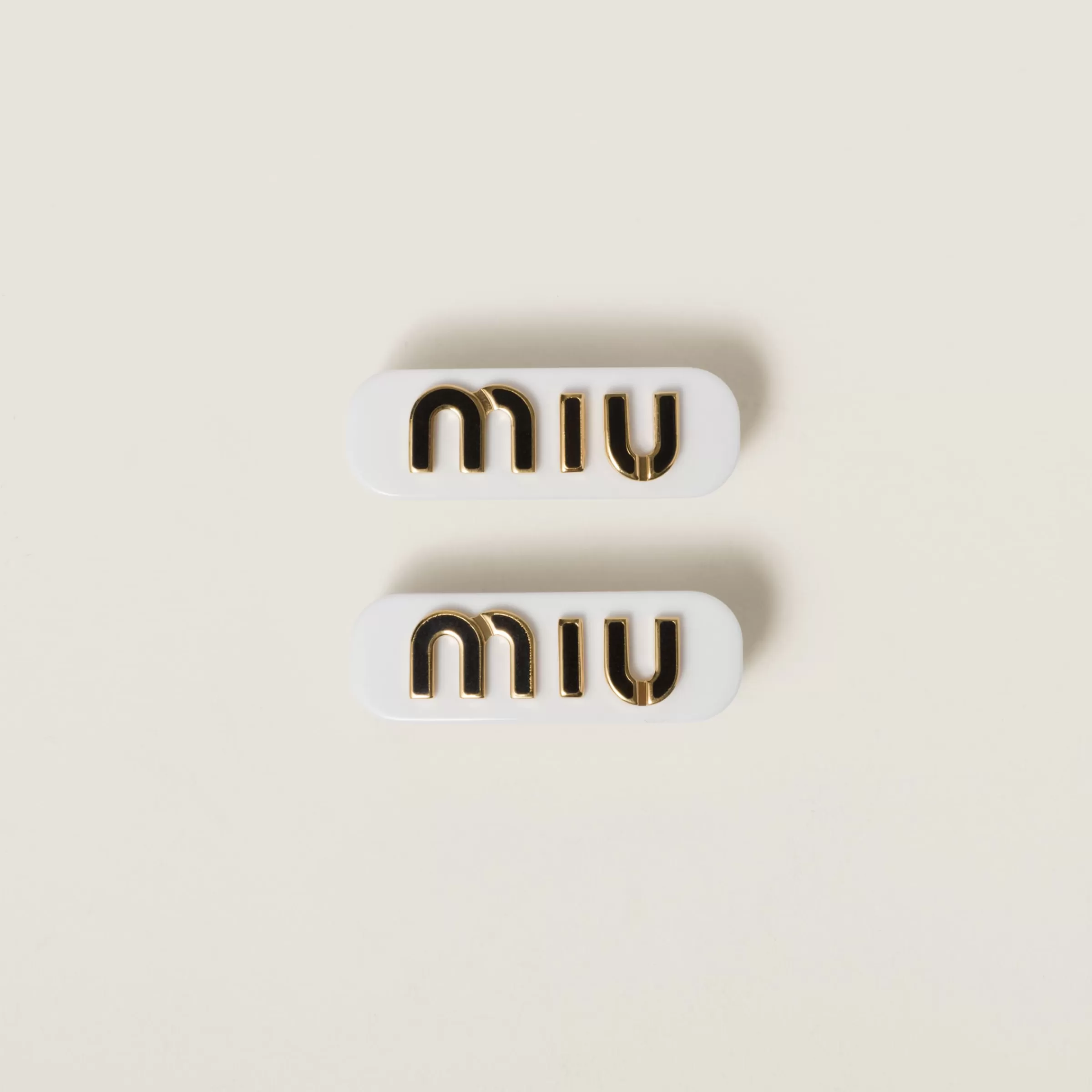 Miu Miu Fermagli in plex e metallo Bianco/Nero Flash Sale