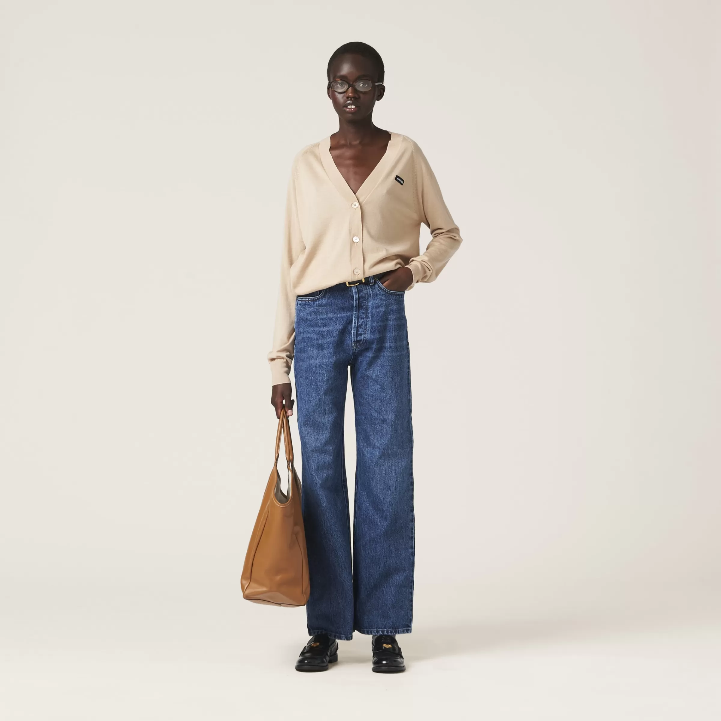 Miu Miu Pantaloni a zampa in denim Blu Cheap