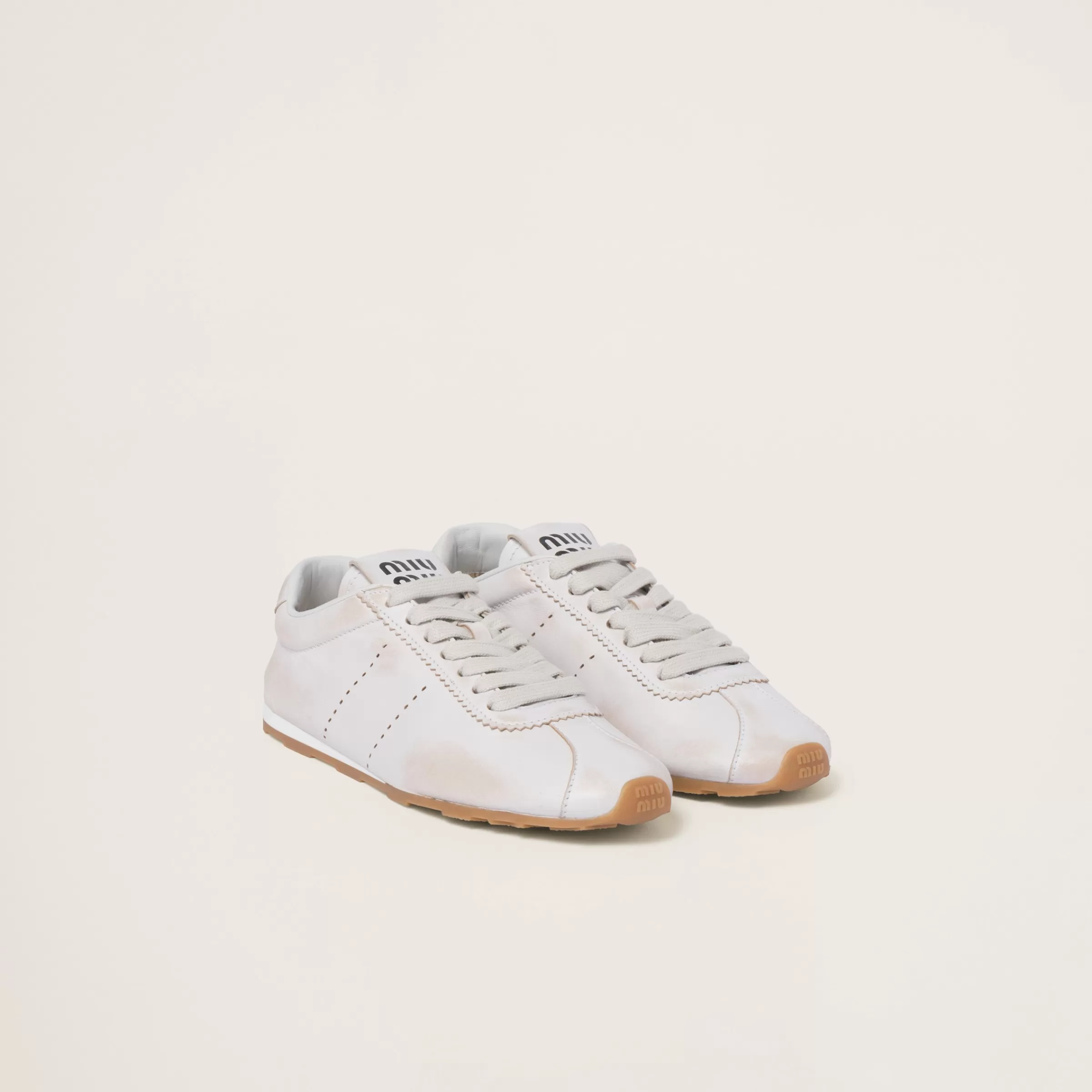 Miu Miu Sneakers Plume in nappa decolorata Bianco Flash Sale
