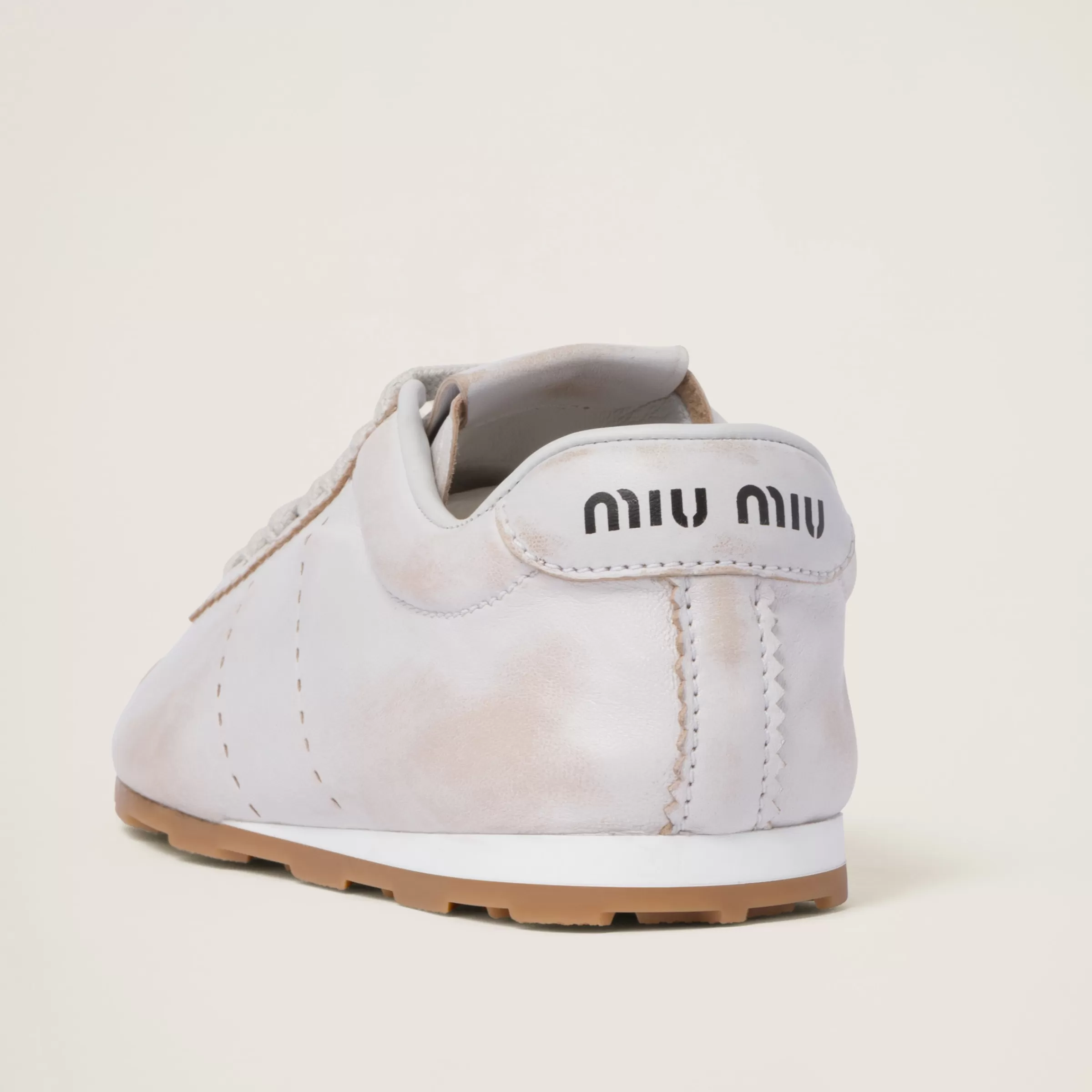 Miu Miu Sneakers Plume in nappa decolorata Bianco Flash Sale