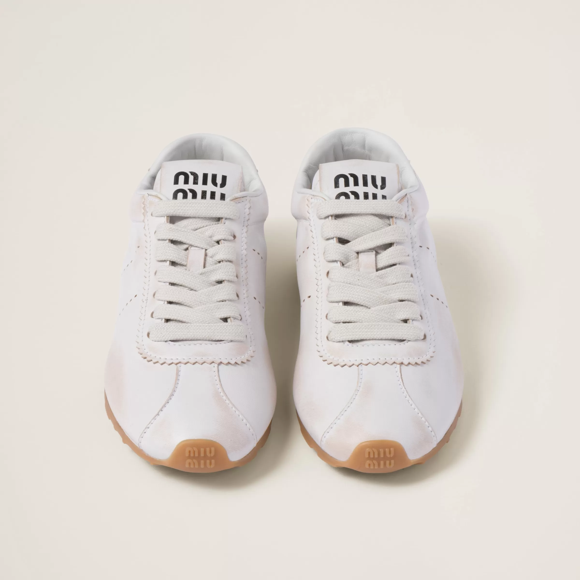 Miu Miu Sneakers Plume in nappa decolorata Bianco Flash Sale